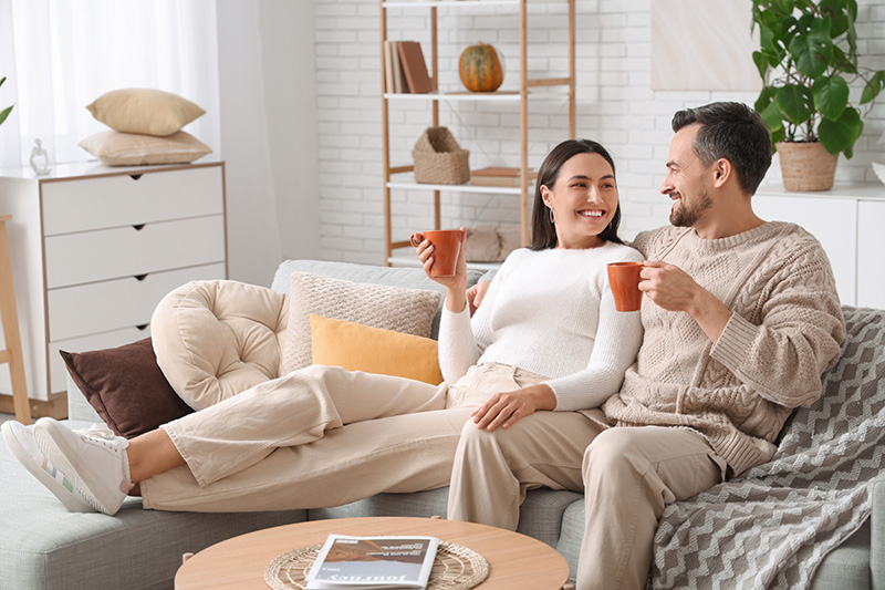 couple-relaxing-in-comfortable-home